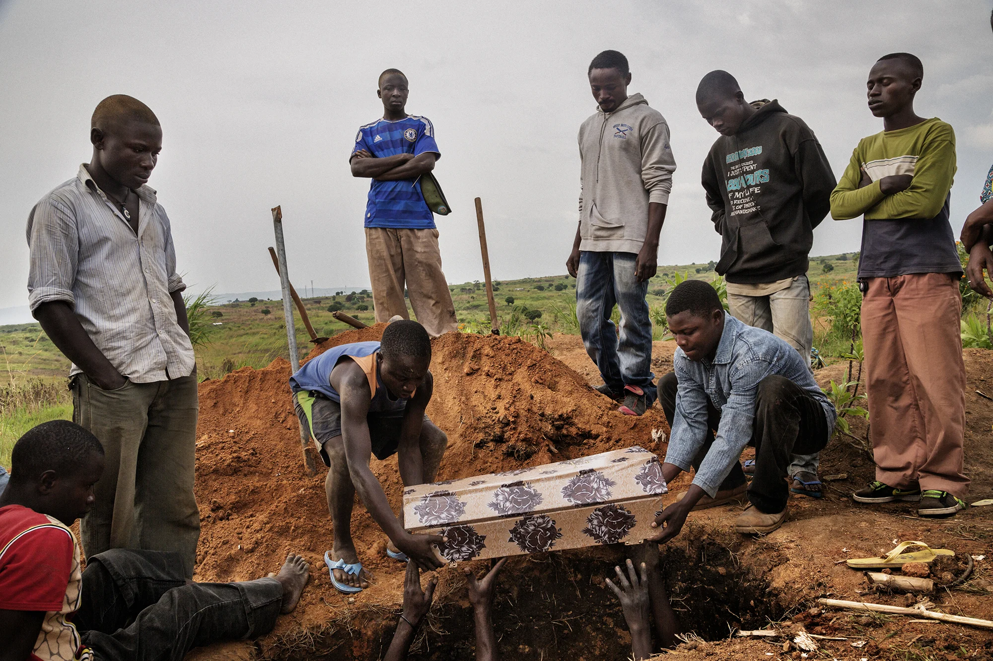 The funeral of Innocent Mwaka, 3 months old who died at the orphanage in Mutzipela, Bunia. Her mother died in child birth and her father is a miner of gold. He abandoned her at the orphanage and left the area. She died of diarrhea