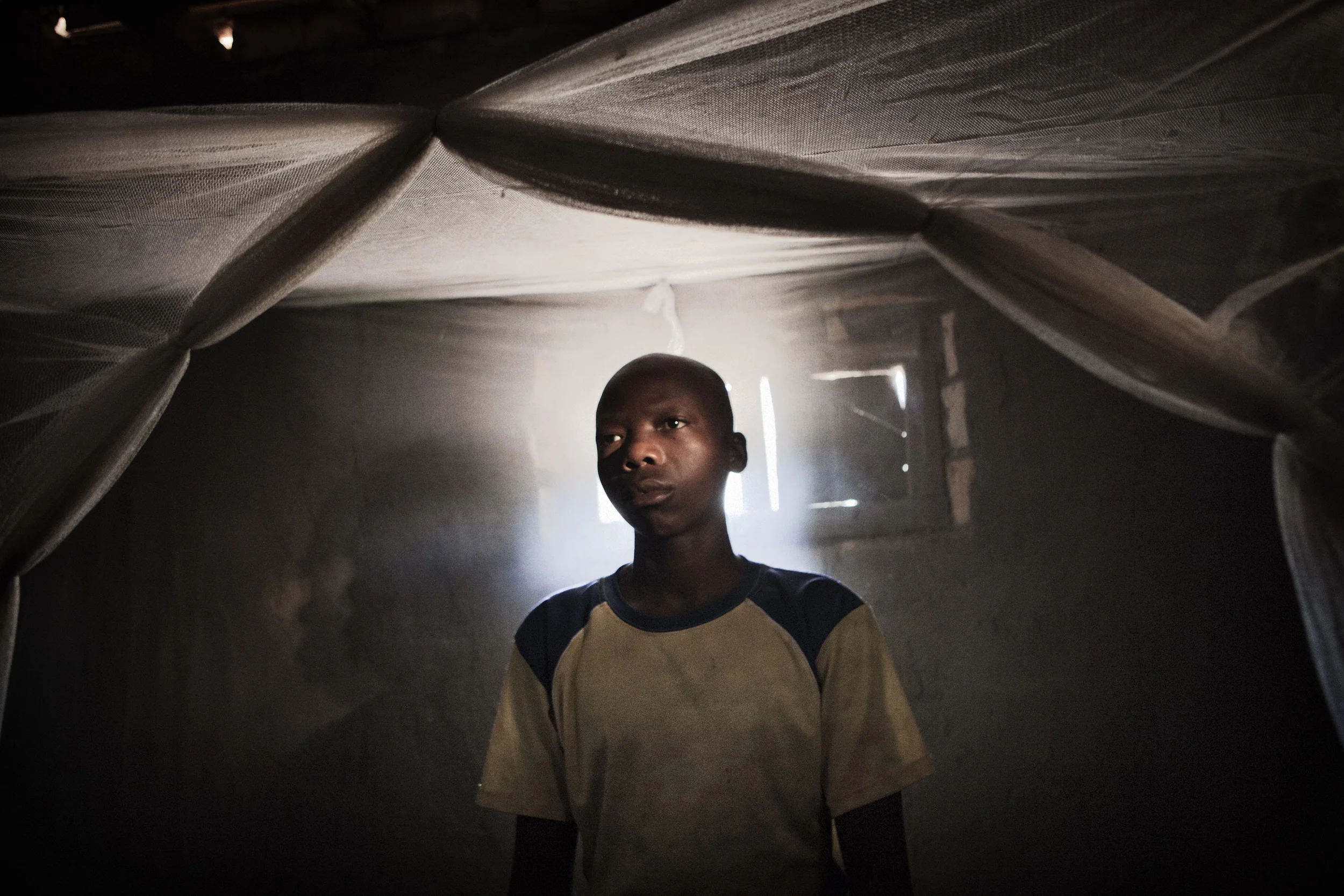 Ted Mamumangi 14. He was taken to Garamba and spent one year and 4 months training to be a soldier. He escaped when the UPDF attacked and shot his guard.