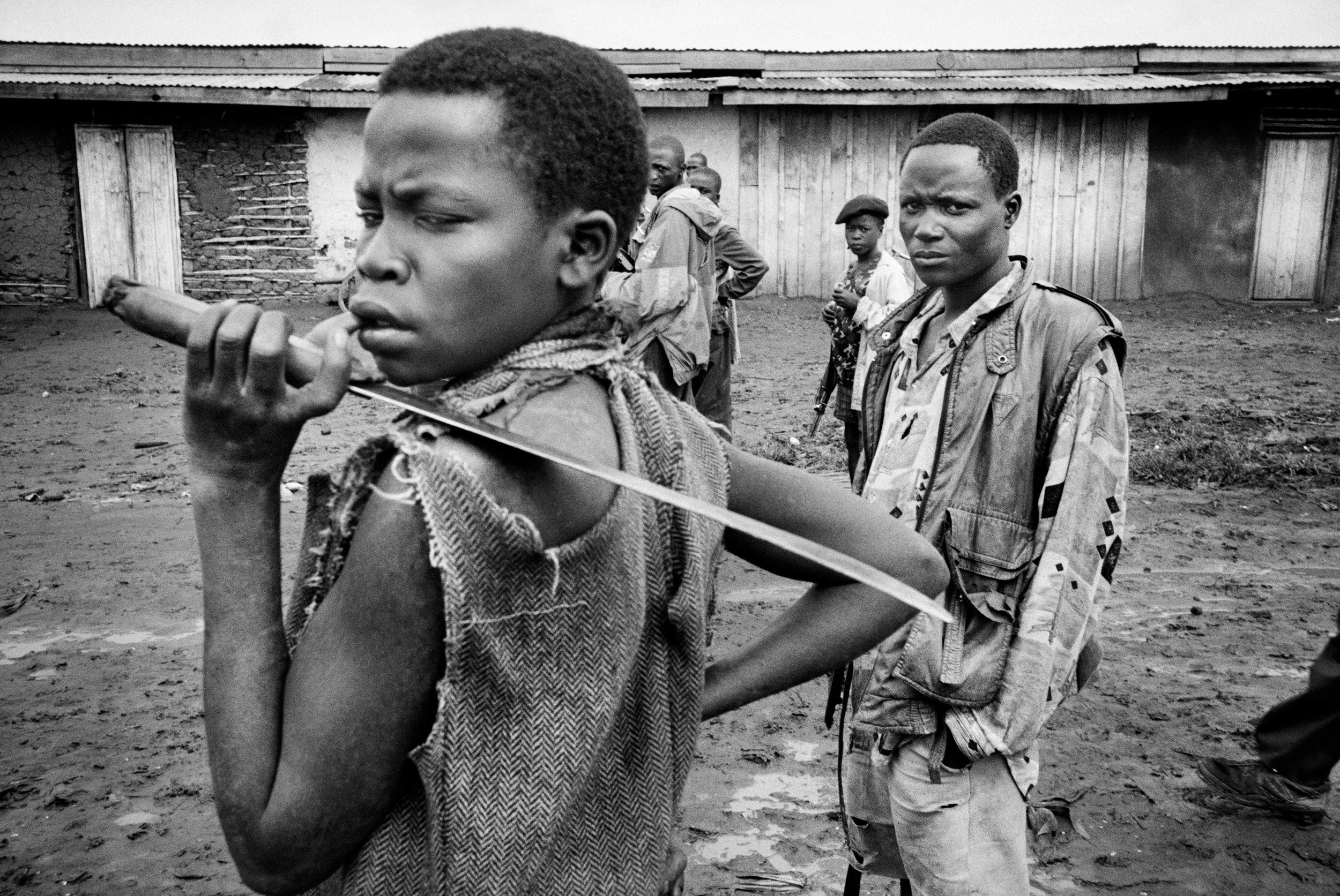 Soldiers of the UPC militia wait for orders in Bule, northeastern Congo. 2003