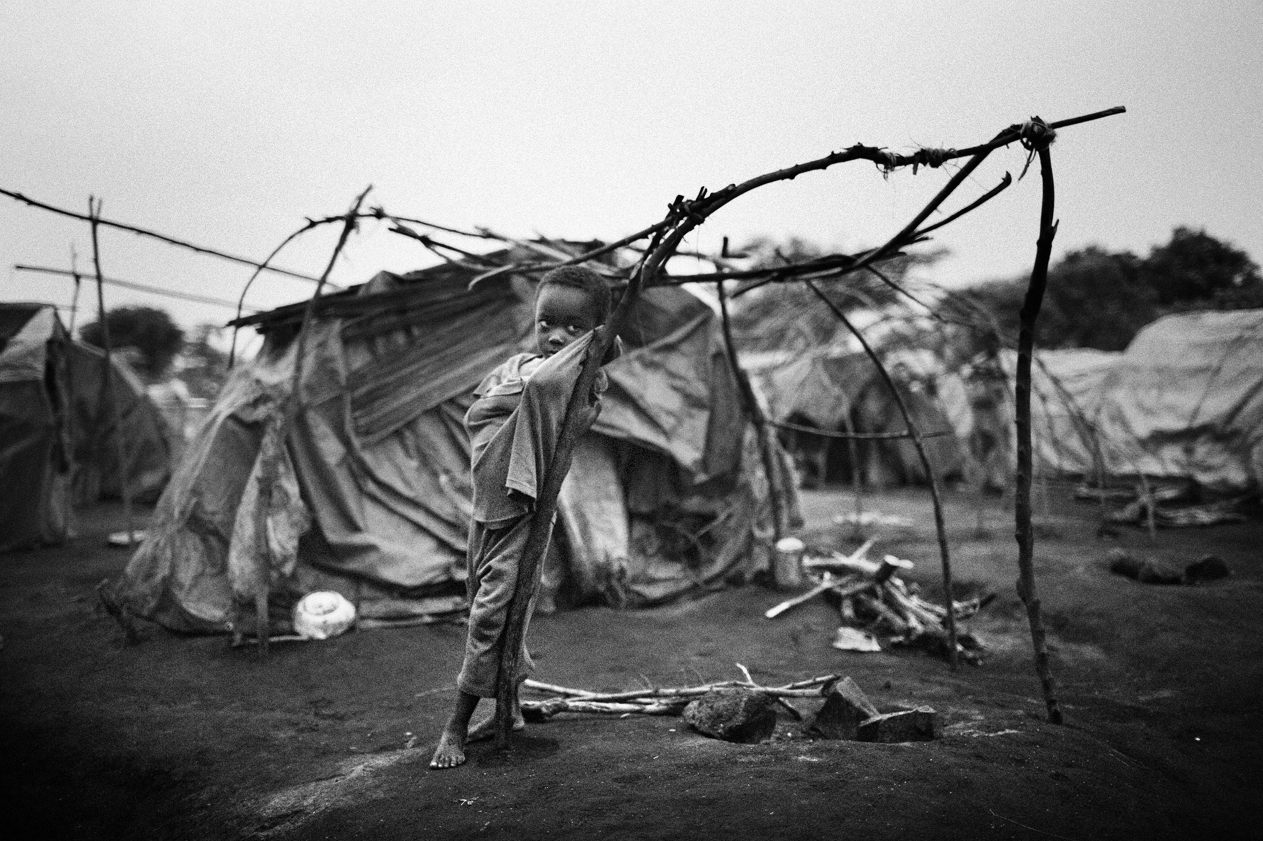 Opangi Molati, five, in Tchomia camp after being displaced by nearby fighting. Around 30,000 displaced people live in this area with limited supplies and virtually no international help. 2006