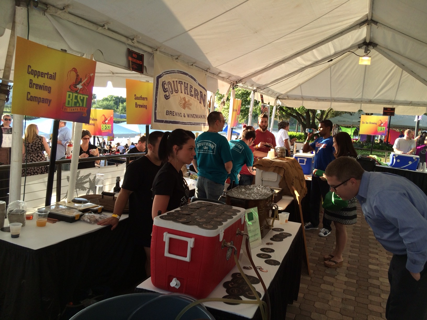 Our newest team member, Teri, serving beer at an event.