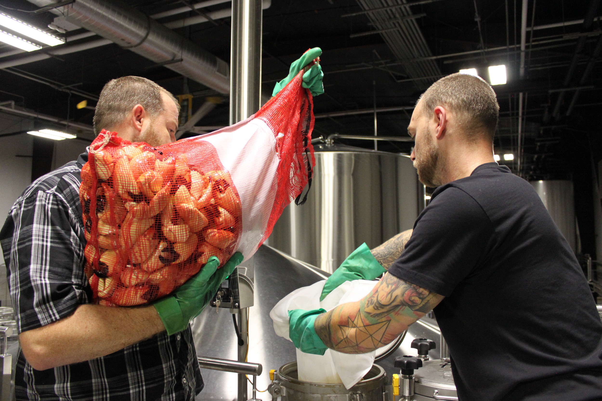 Casey and Derrick add fresh crab claws to Captain Jack's Stone Crab Stout.