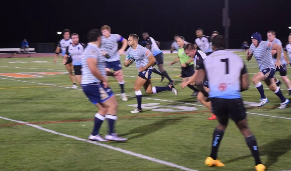 Arber Cojab splitting the defense set up Tristan Leclere for his second try of the night. 