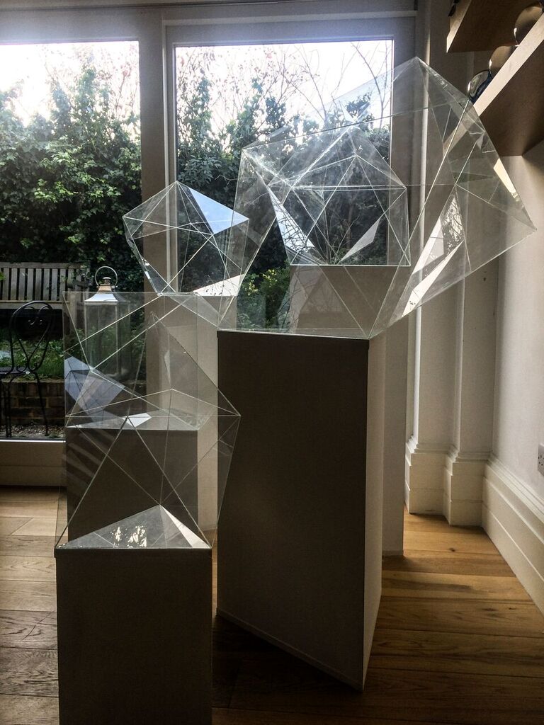  Shuster and Moseley  Antiprisms  (installation), 2016 Hand cut and bonded glass Varying dimensions 