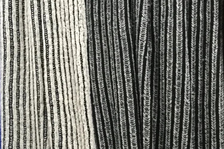 Detail: black/white throw, front and back