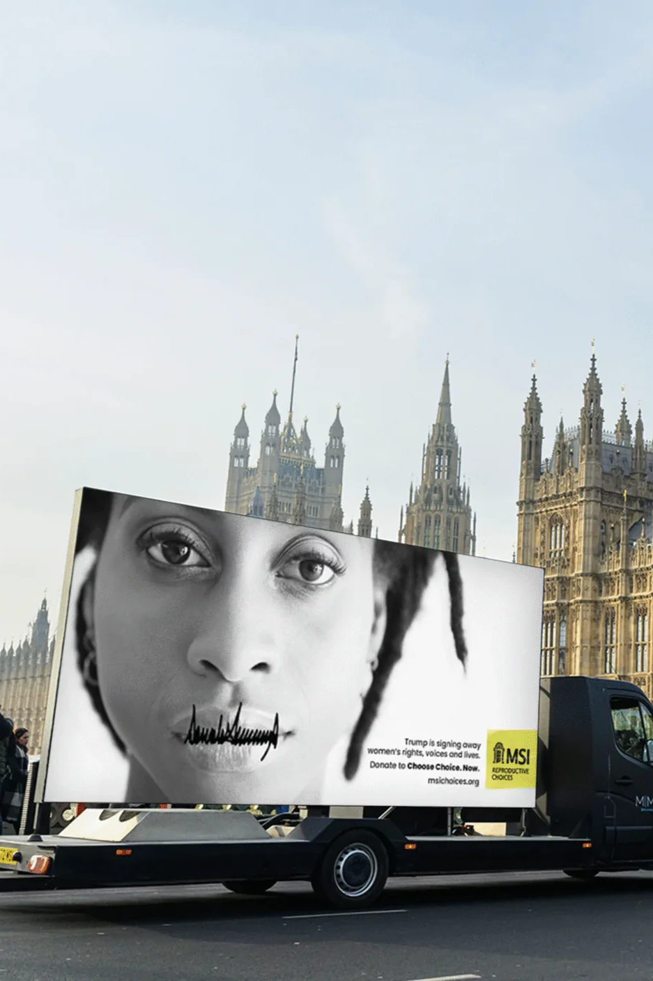 Image of a Digivan in front of the Houses of Parliament