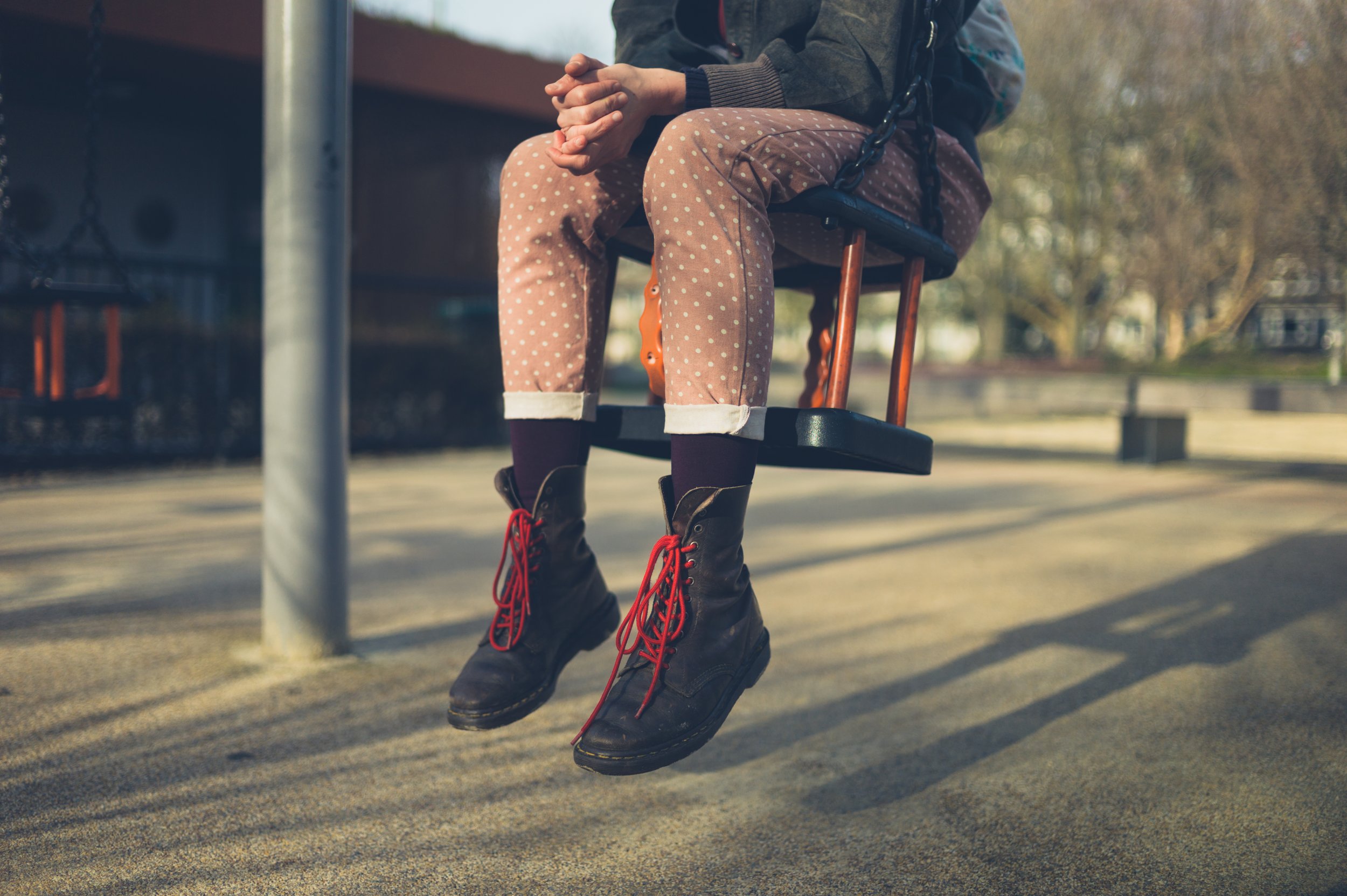 Girl on a swing at the park