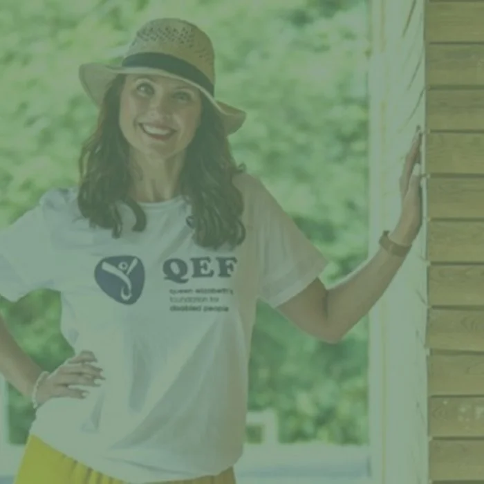 Emma Barton stood at QEF building