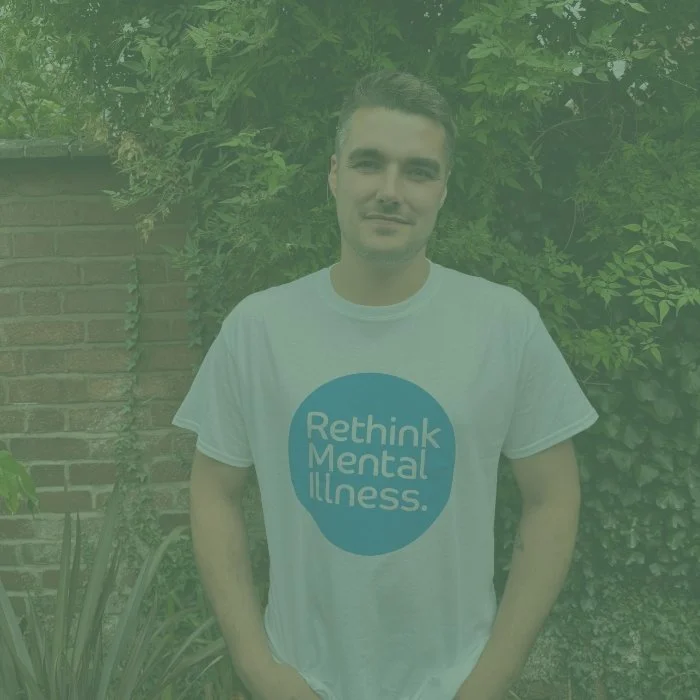 Chris Hull standing in a garden