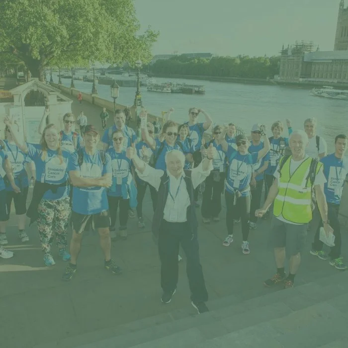 Jonathan Dimbleby leading a charity walk through London 