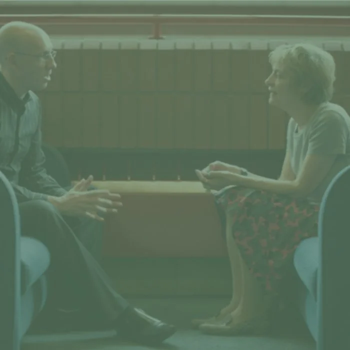 Two people taking about bereavement