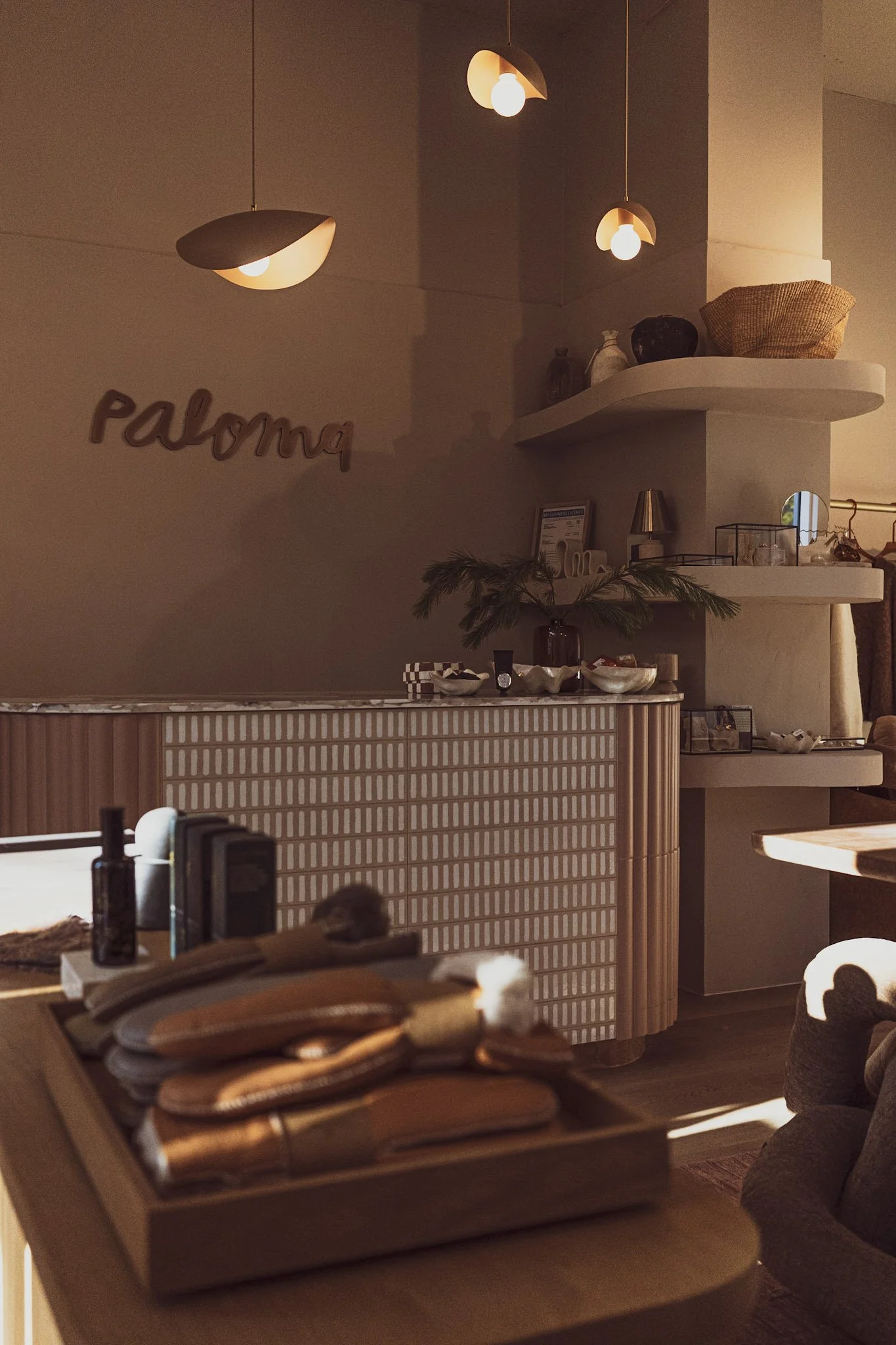  - Construction of check out counter and curved floating shelves.  