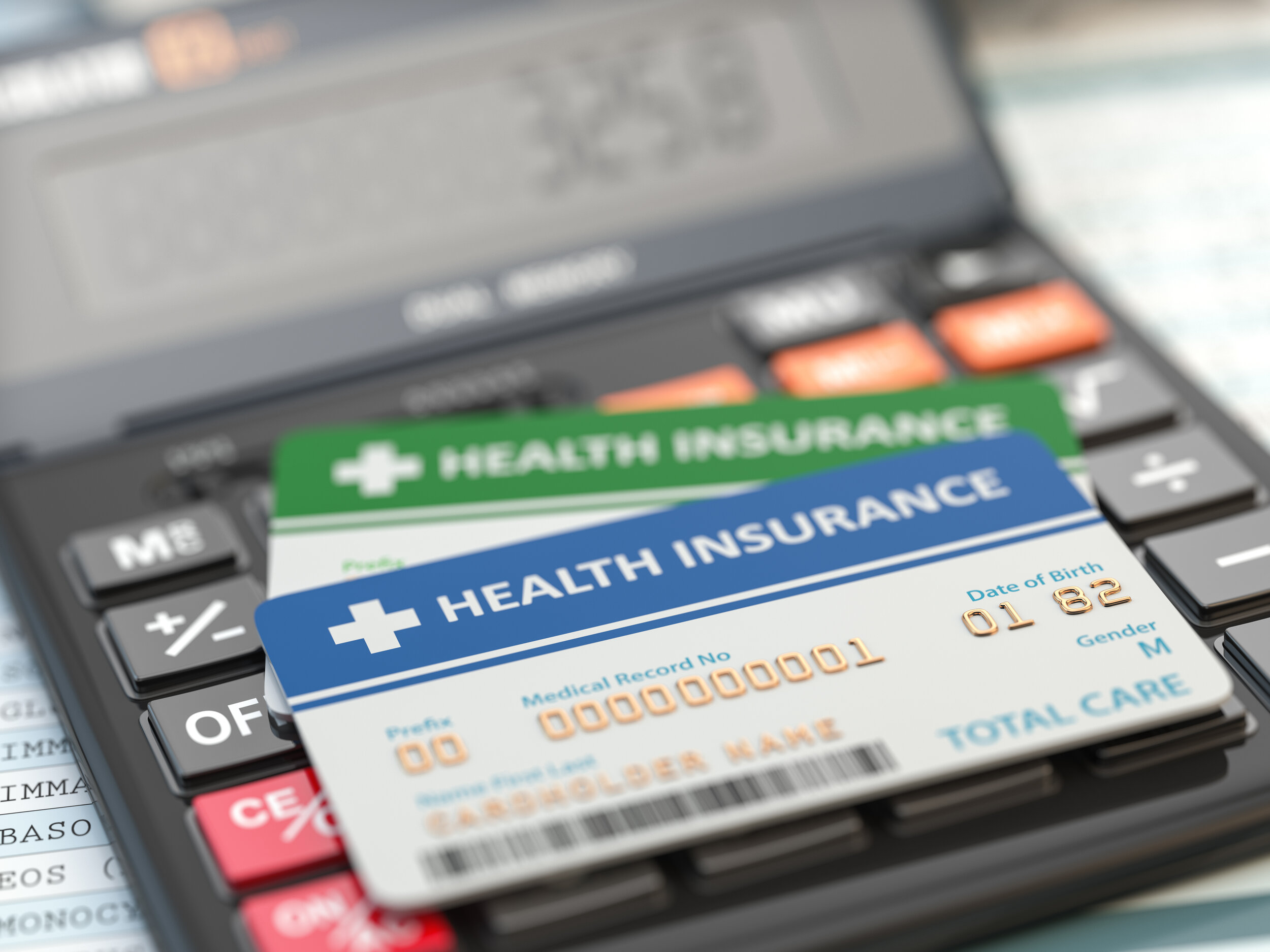 medical-insurance-cards-on-the-calculator-health-c-DZGUK9R.jpg