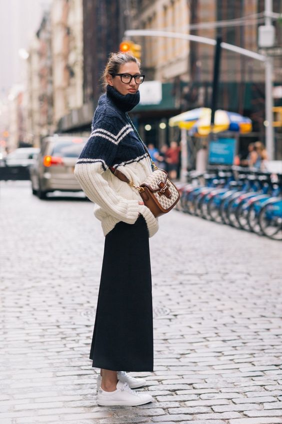 I was going to snap a quick picture but instead went and talked to her. This is older, but still a great example. (image via pinterest but looks very sartorialist)