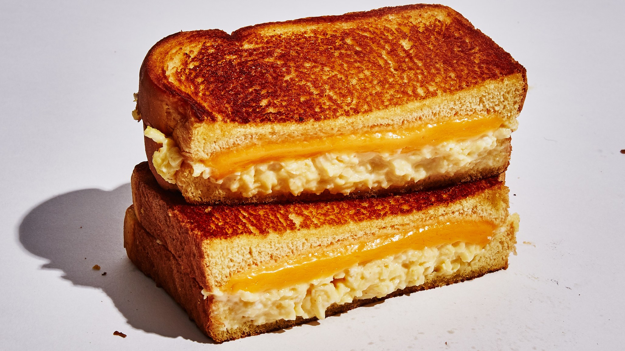 I love this picture and would frame it. "Wylie Dufresne’s Scrambled Egg Sandwich." (image by Alex Lau via Bon Appetit)