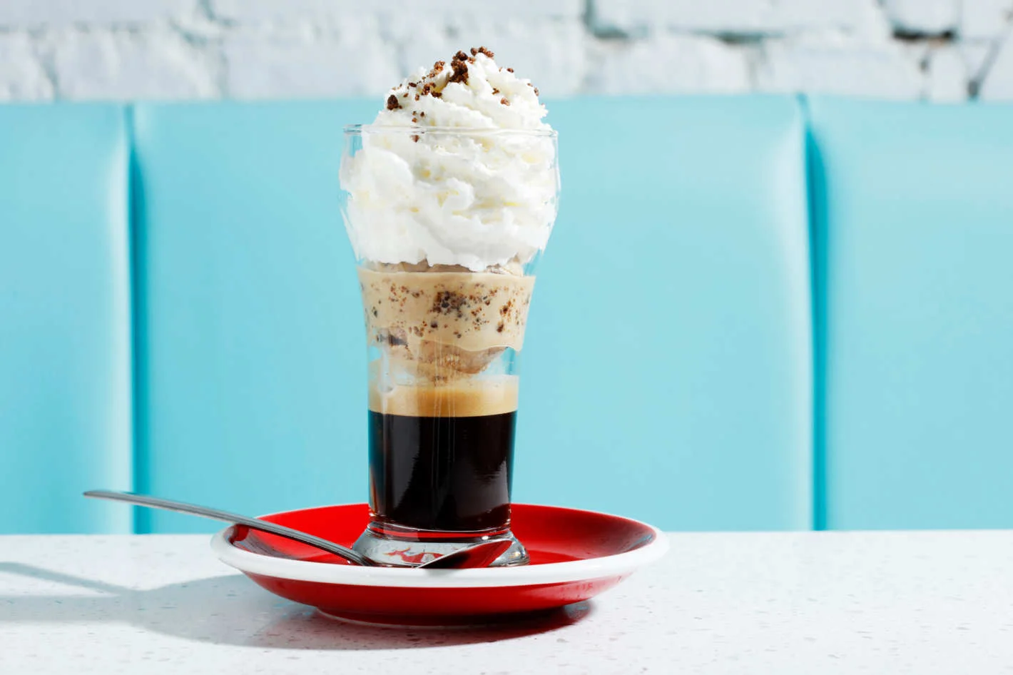 The café liégeois, a sort of parfait meets sundae made with espresso, coffee-crunch ice cream, wafer cookie, and coffee “soil.” (Photo by Melissa Hom via nymag)