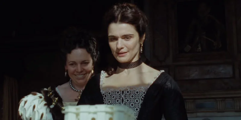 Olivia Colman and Rachel Weisz in the The Favourite .