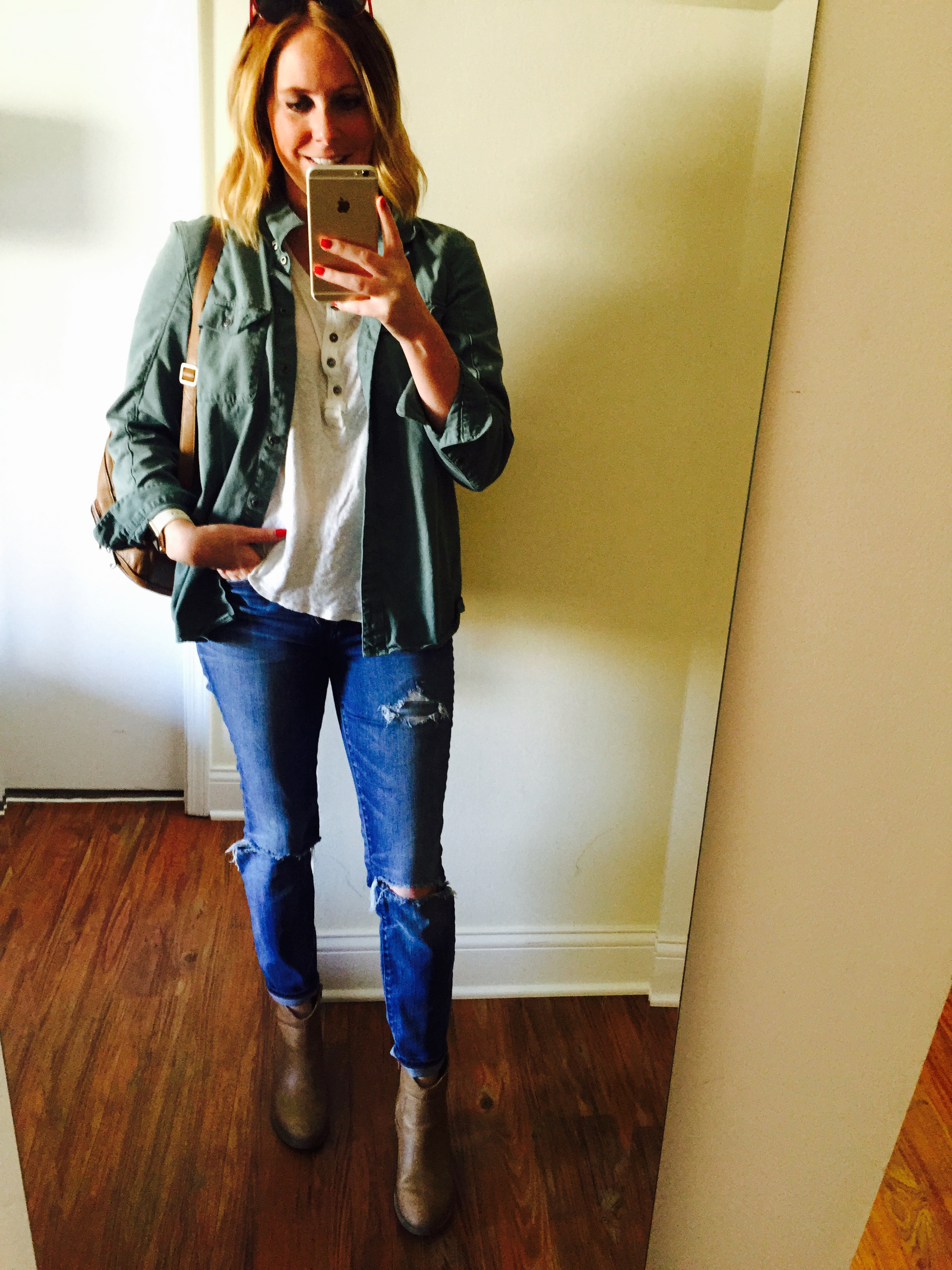 T-shirt: Shirt: Free People, We The Free Downtown Girl Henley , Button Down: Madewell, Jeans: Madewell, High Riser Skinny , Boots: Old Navy, Backpack: Fossil 