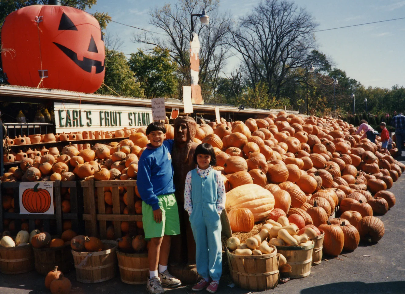 107 w Brandon at pumpkin stand.jpg