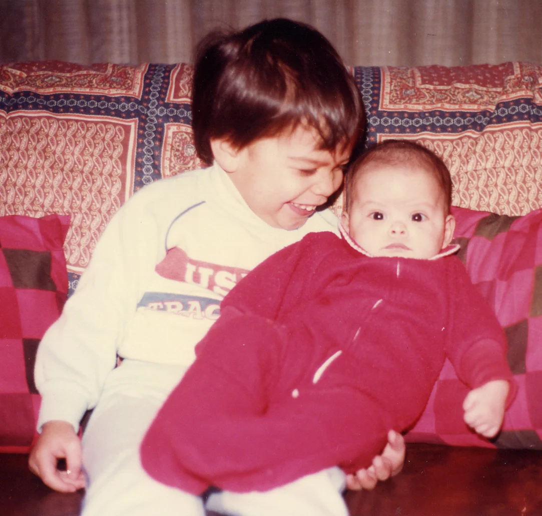 226 sitting on couch w Brandon 1984.jpg