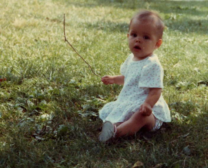 228 sitting on grass 1984.jpg