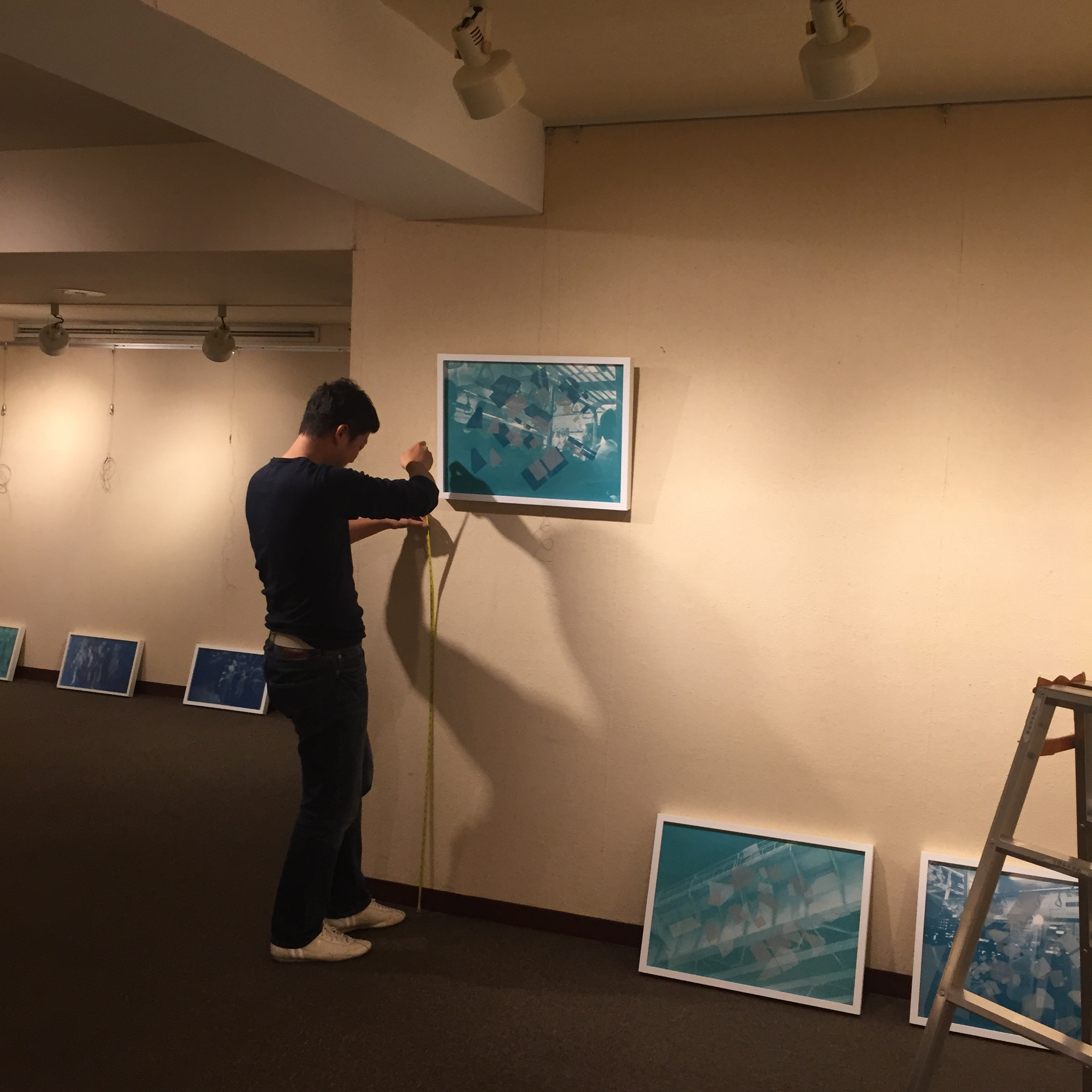 Hanging the show, my good friend put up my works!