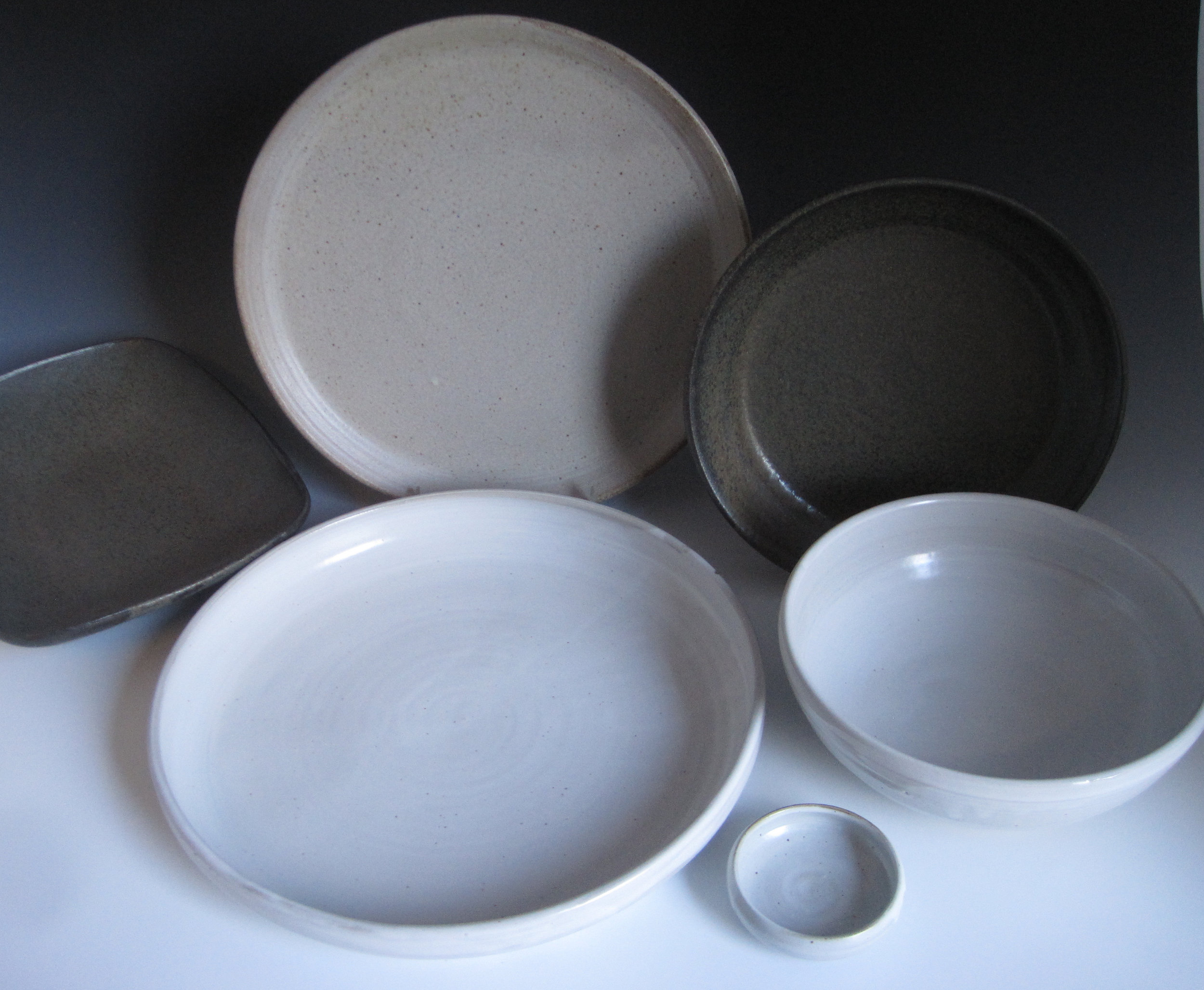 Clockwise from left: Comfort Dish, Slope Rim Plate, Pie, Bistro, Dollop, Clement
