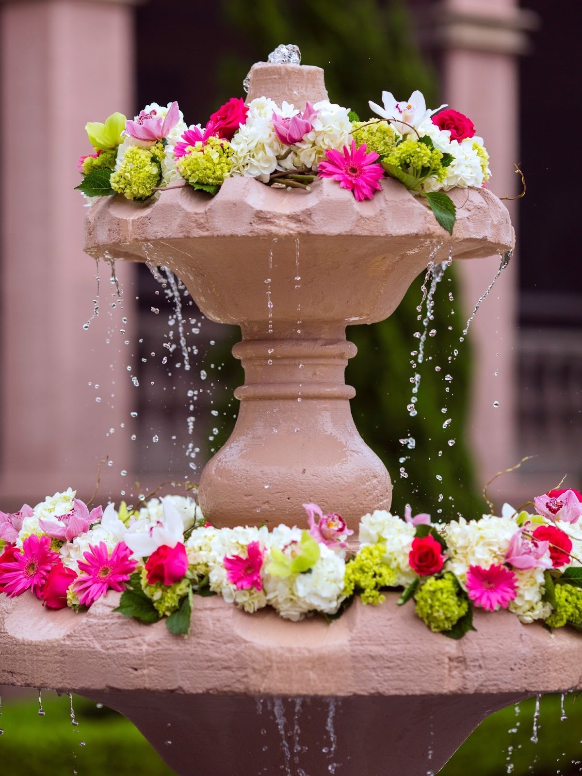Photo Credit Jensen Larsen Photography Fresh flowers laid on flowing water. Do you love vibrant colors?