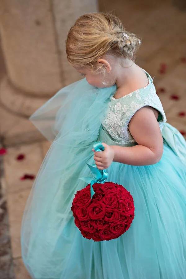 Photo Credit: Kristen Weaver I'll always recommend pomanders. These classic floral arrangements are perfect for flower girls that don't want a bouquet. 