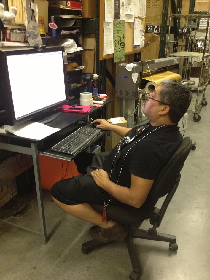 Creative Director of Raining Roses, Jesus Rodriguez, creating the amazing graphics for the dance floors. 