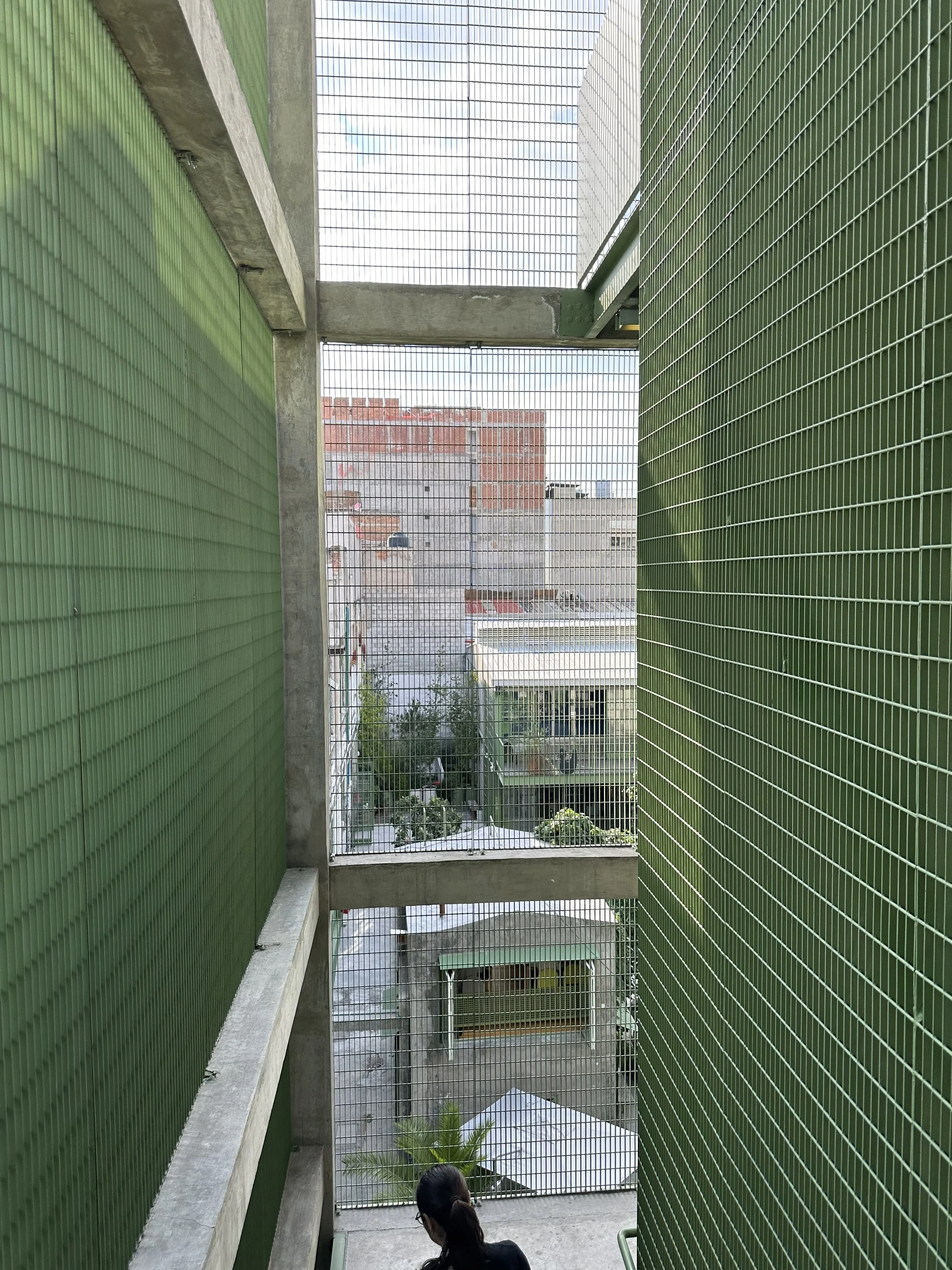 Laguna Development Green Walls line every face of this little Breeze Way