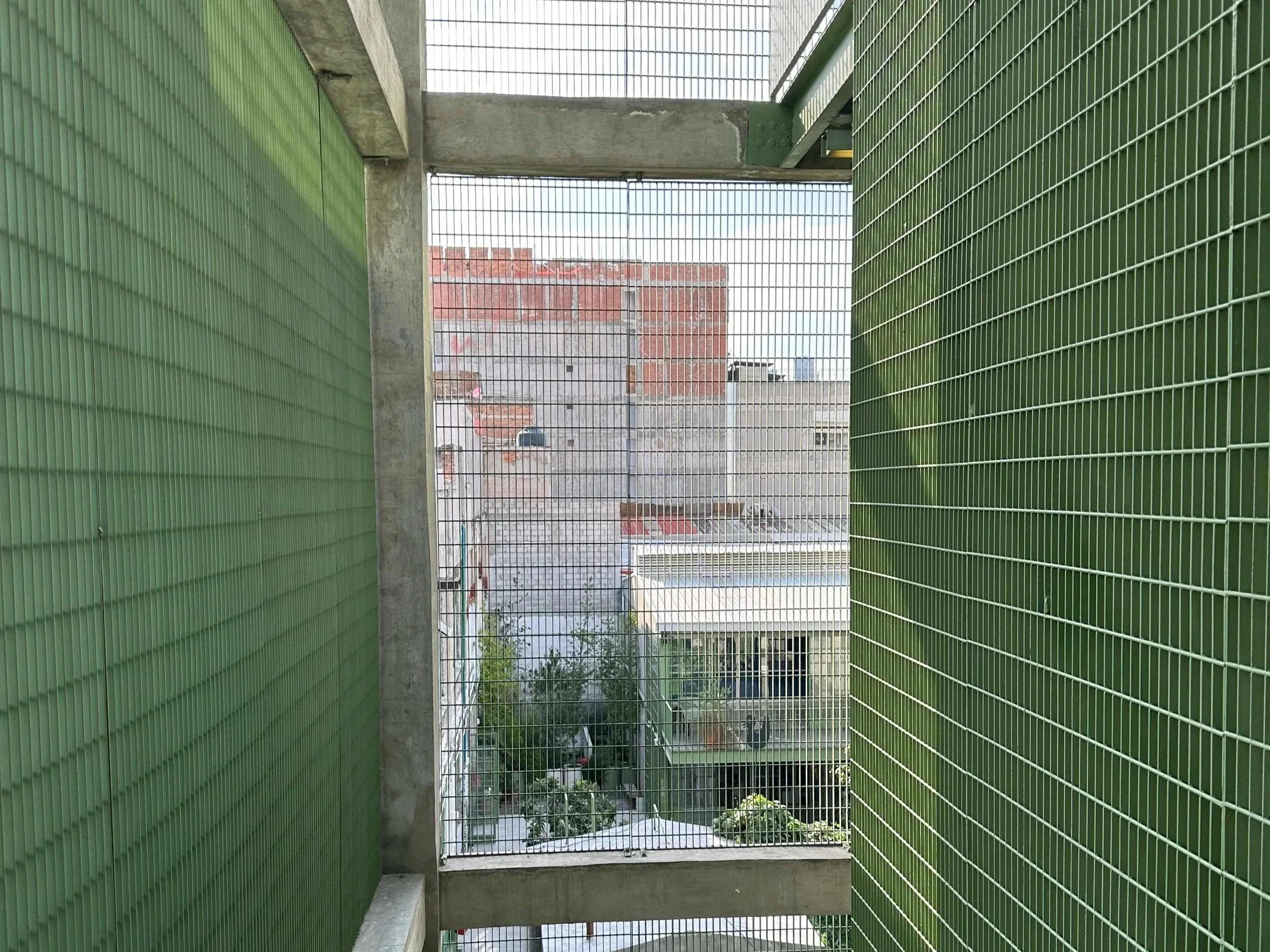 Laguna Development Green Walls line every face of this little Breeze Way