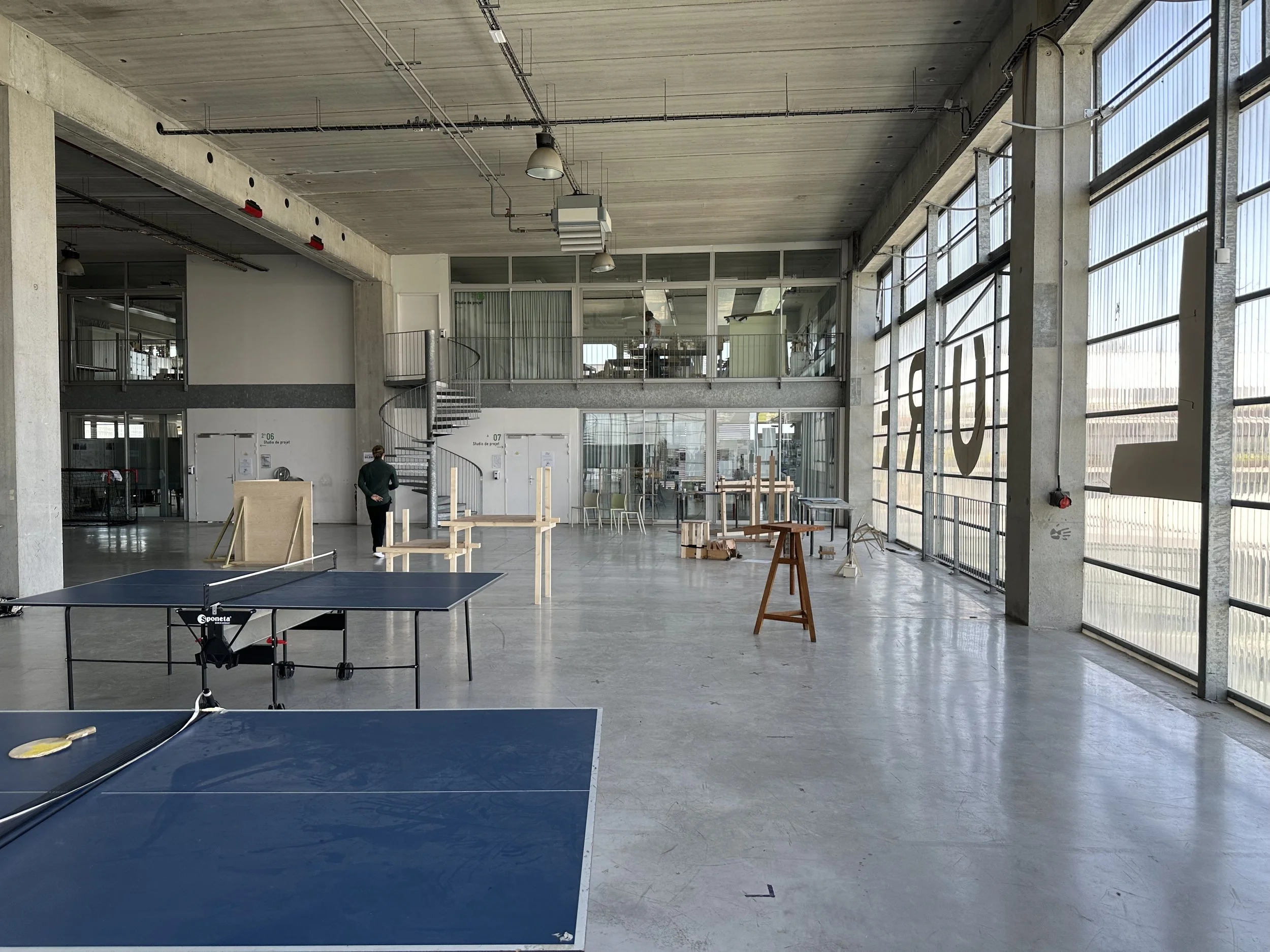 Lacaton And Vassal ENSA Open Concept Work Space with Pingpong Table and Saw Horses