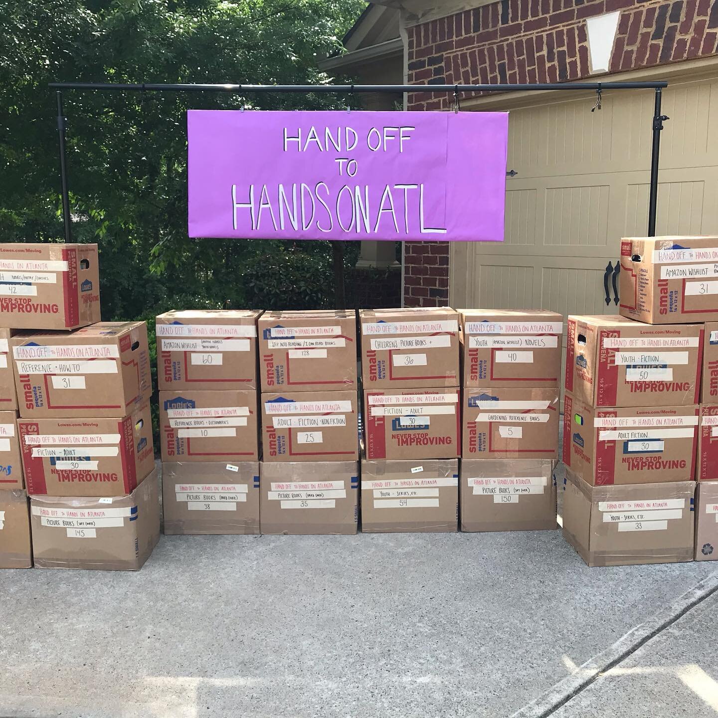 Behind the scenes of our #handofftohandsonatl Book Drive. 
There are 1,353 books in these boxes. 
We&rsquo;re grateful for the partnership with @handsonatl to get these books distributed. 
Also, sending high fives to all the donors and supporters- we