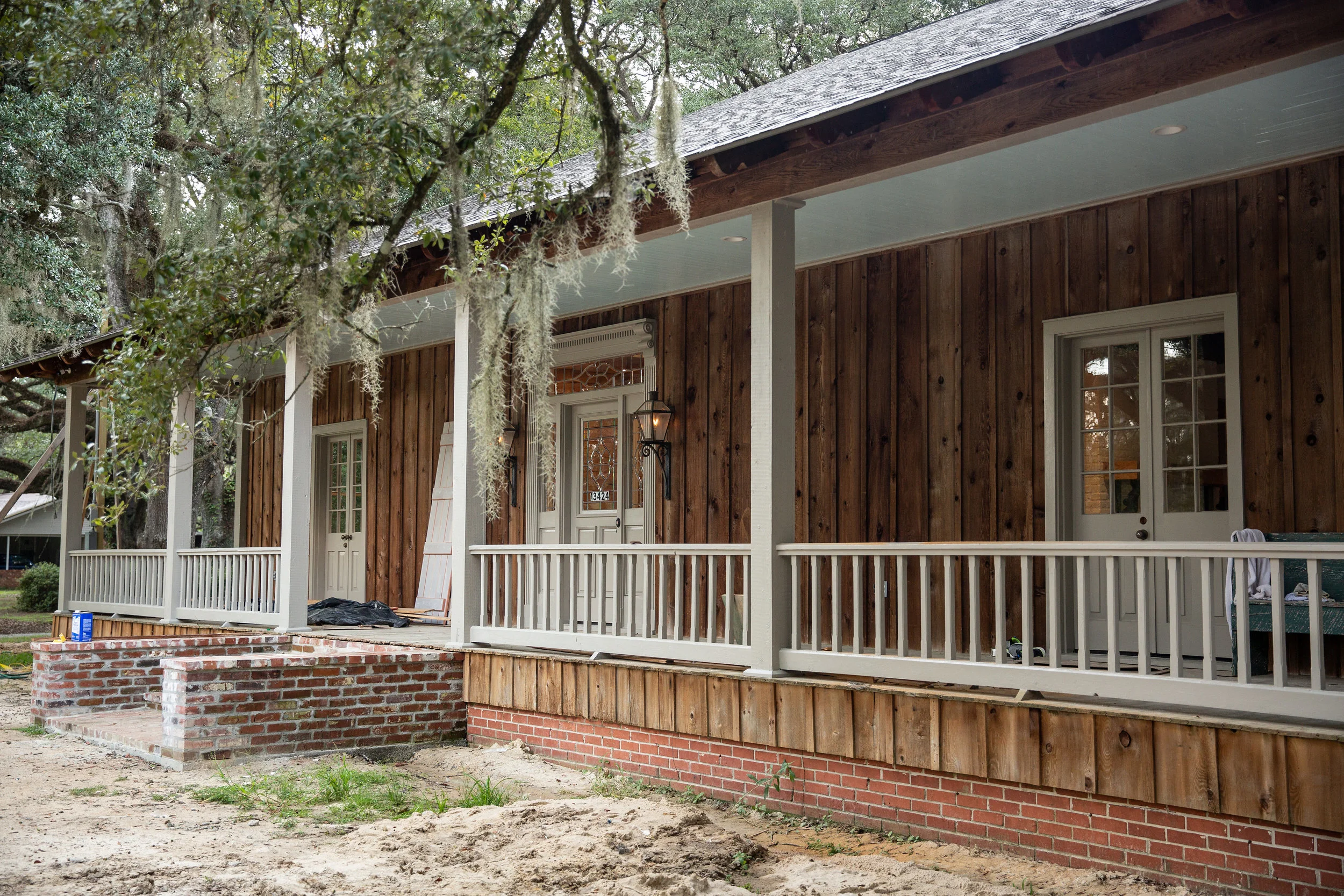 A wide front porch complete with original gas lamps welcomes visitors to sit a spell—to enjoy the fall weather to come.