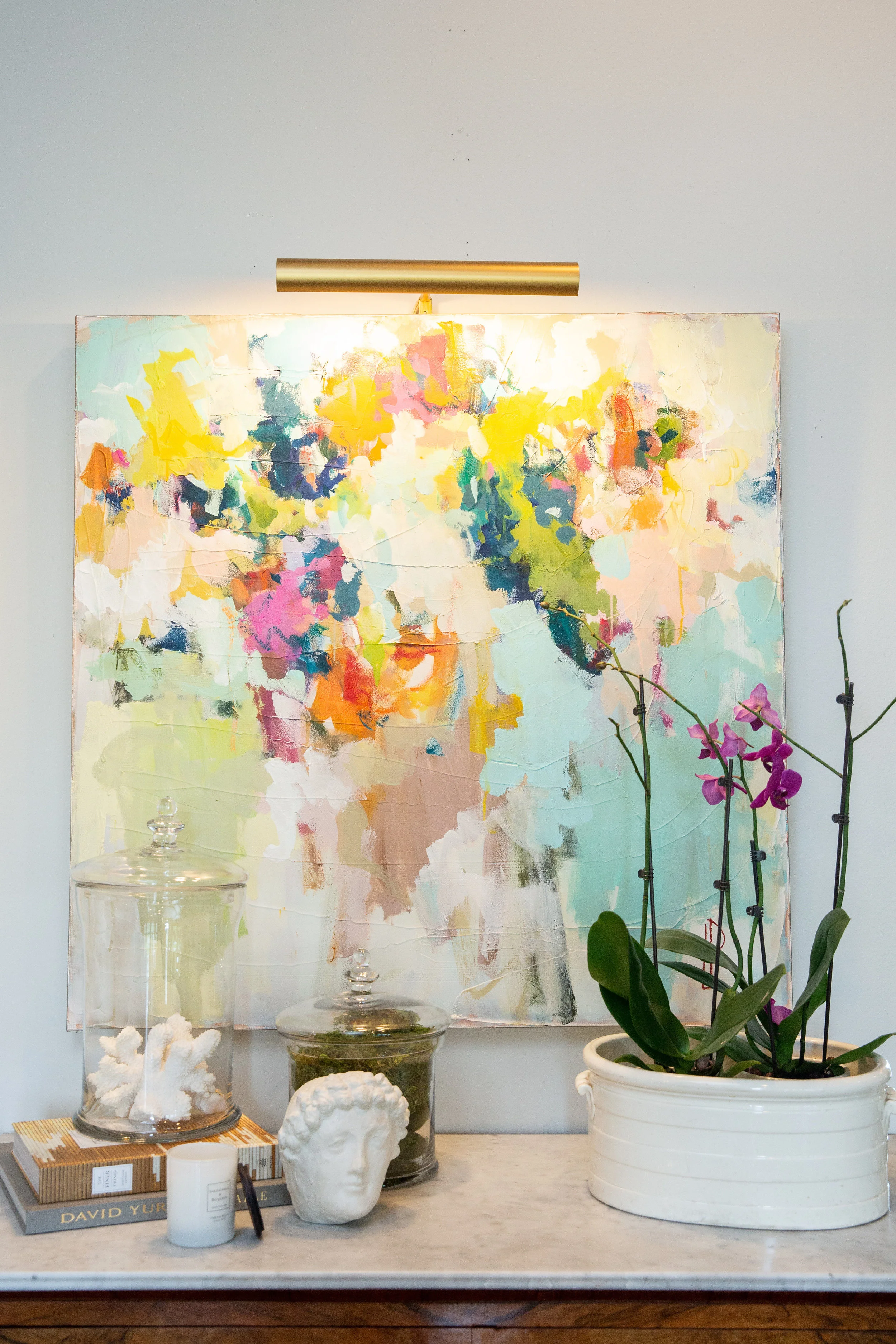 Lauri and Storm worked together on finding just the right piece to compliment an eclectic, color-loving style. This piece was commissioned from a local artist.