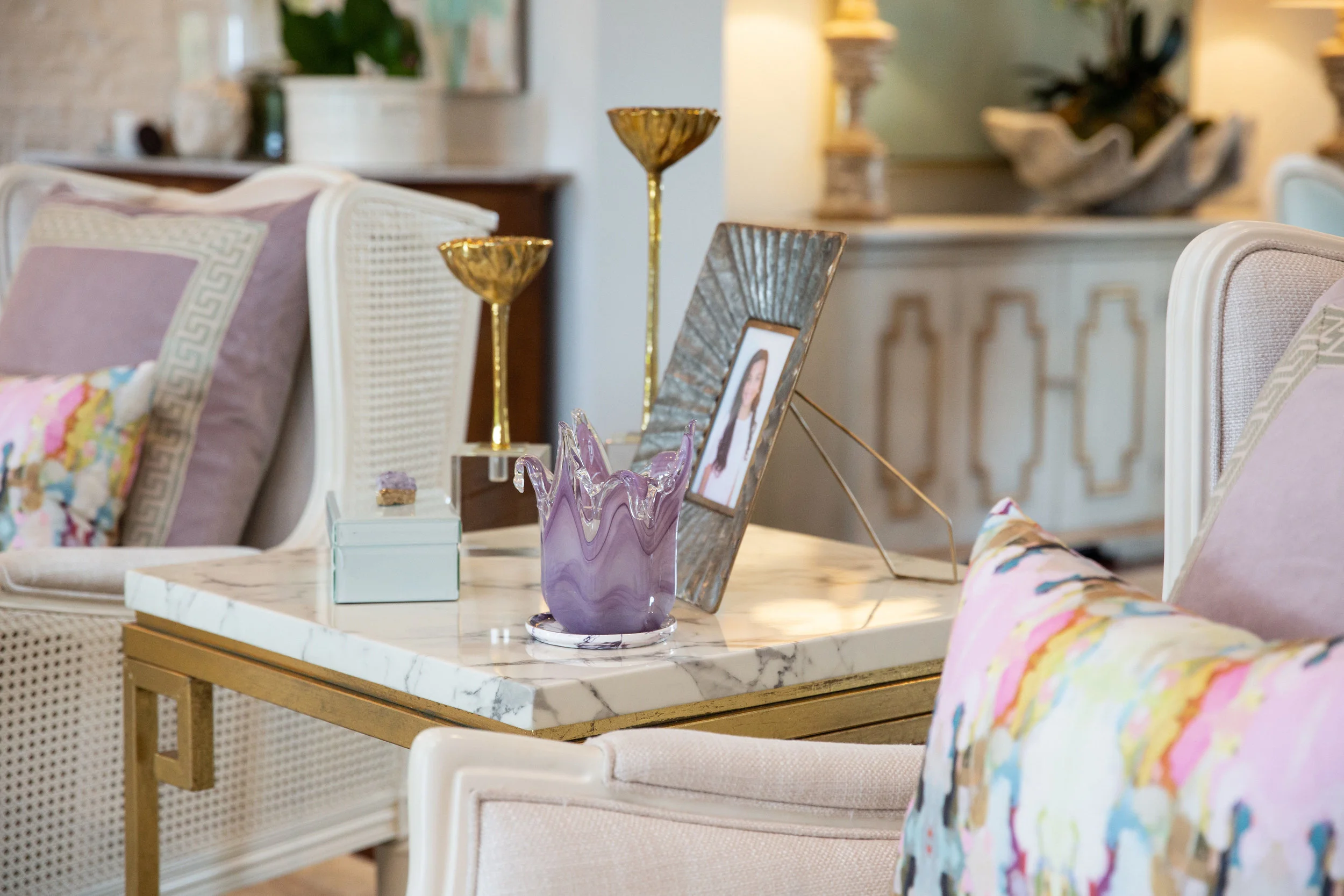 Custom pillows and decor pieced together from Signature’s showroom create an effortless style when combined with family treasures.