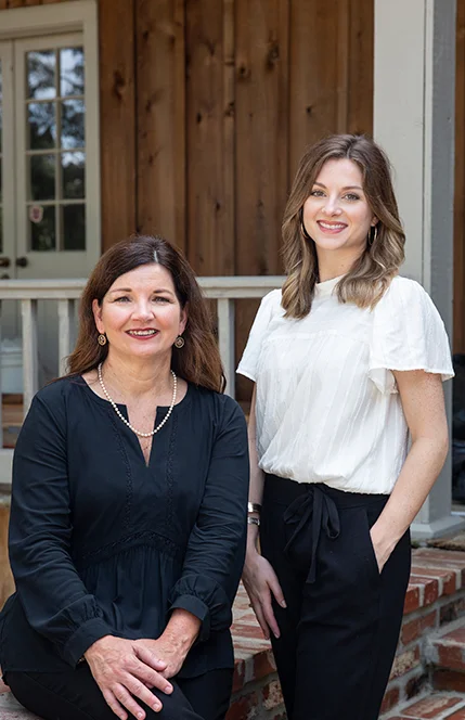 The mother-daughter design team of Melane Landry and Erin DeRouen.