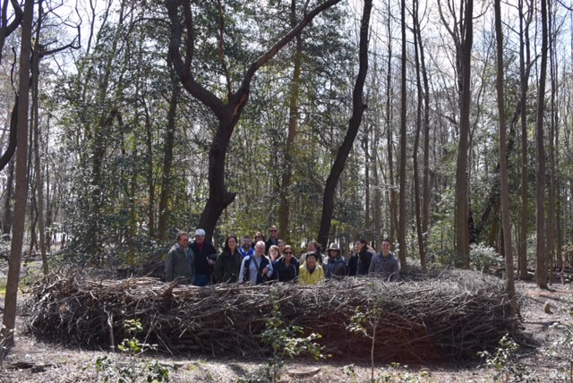 The spring migration has started! Newly cleared paths meander through the site's 12 acres of woodland. Executive Director Sheryl Swed awaitED the group near the Pepper Creek shoreline. — at Delaware Botanic Gardens at Pepper Creek .