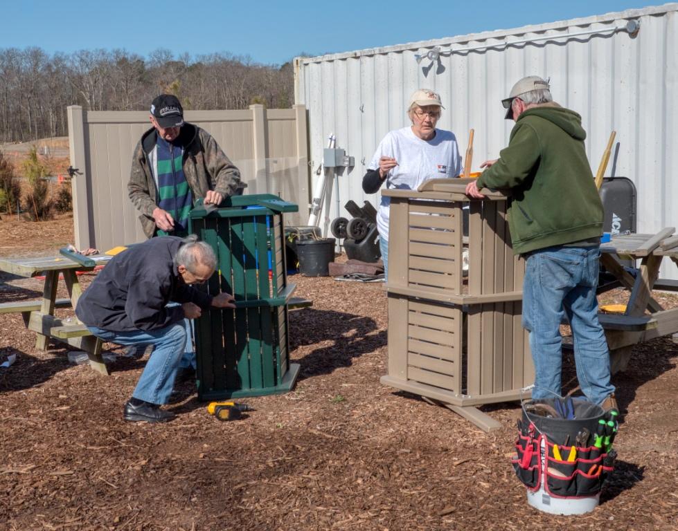 Ron Bass, George Robbins, x and y assembling benches.jpg