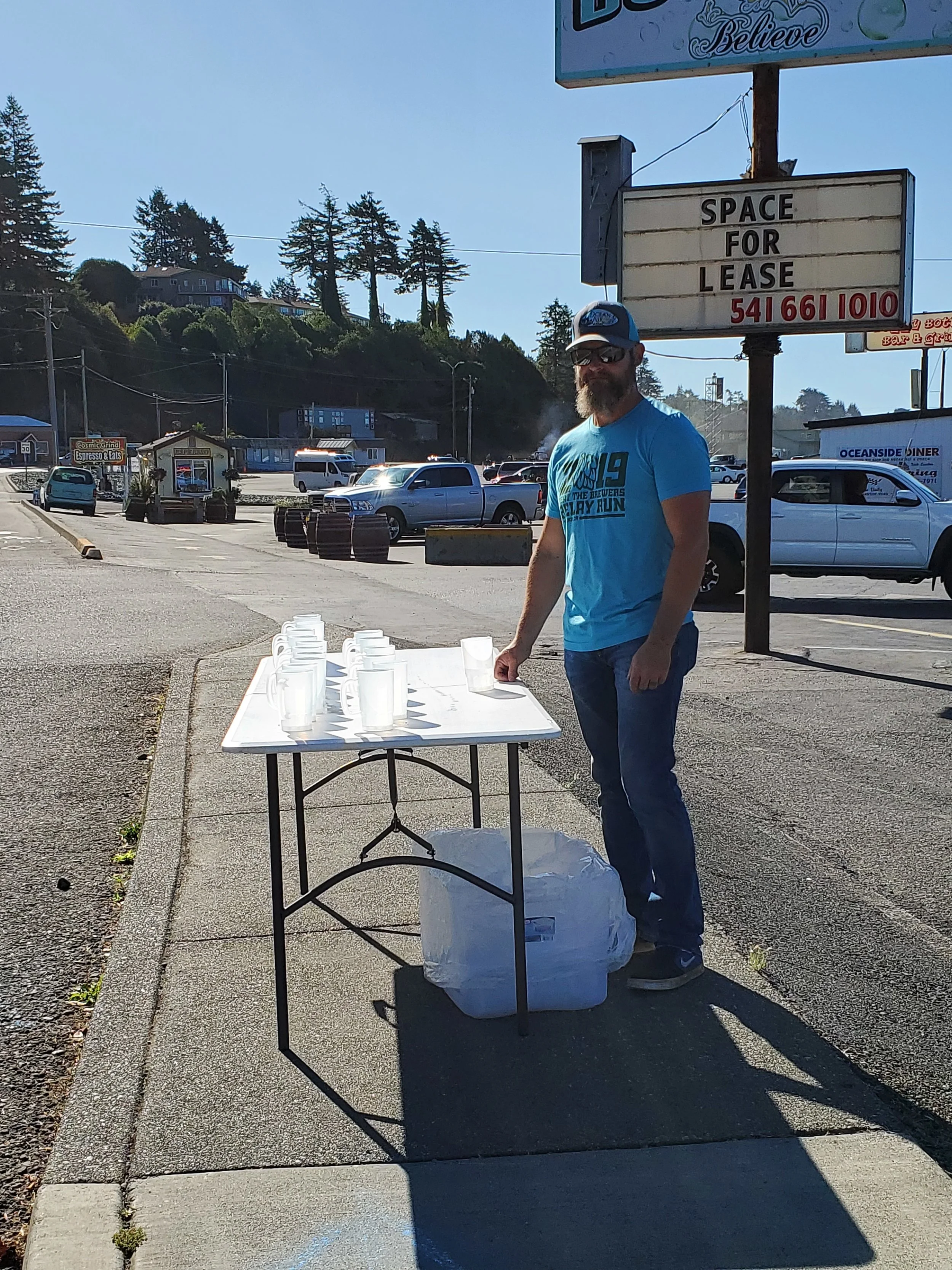Tom volunteering at the mug station