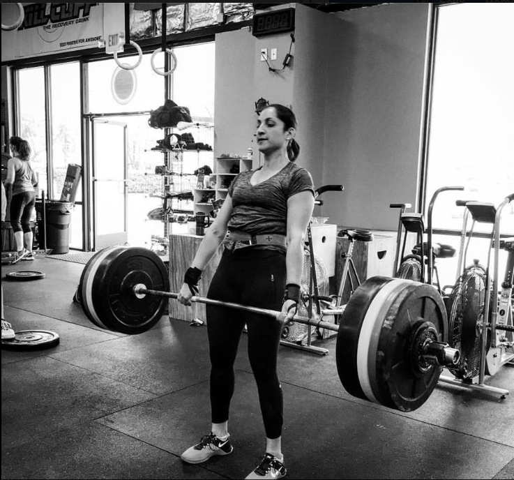 That is 300 pounds on the bar - if we were brave would would guess: more than two times the weight of the rower