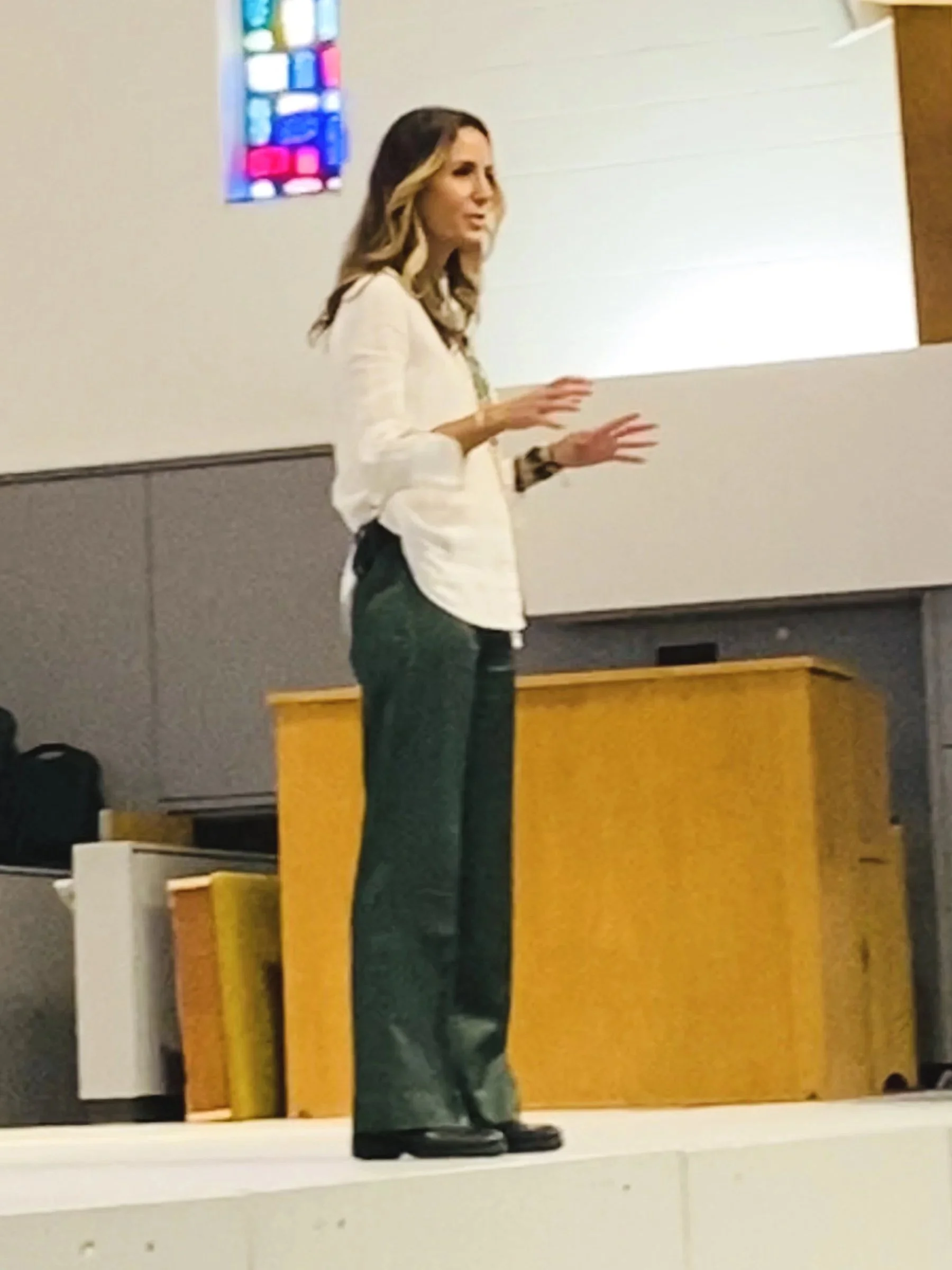 Goli Gabbay speaking at a college wellness keynote on stress and anxiety
