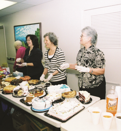 Volunteers serving refreshments after the service