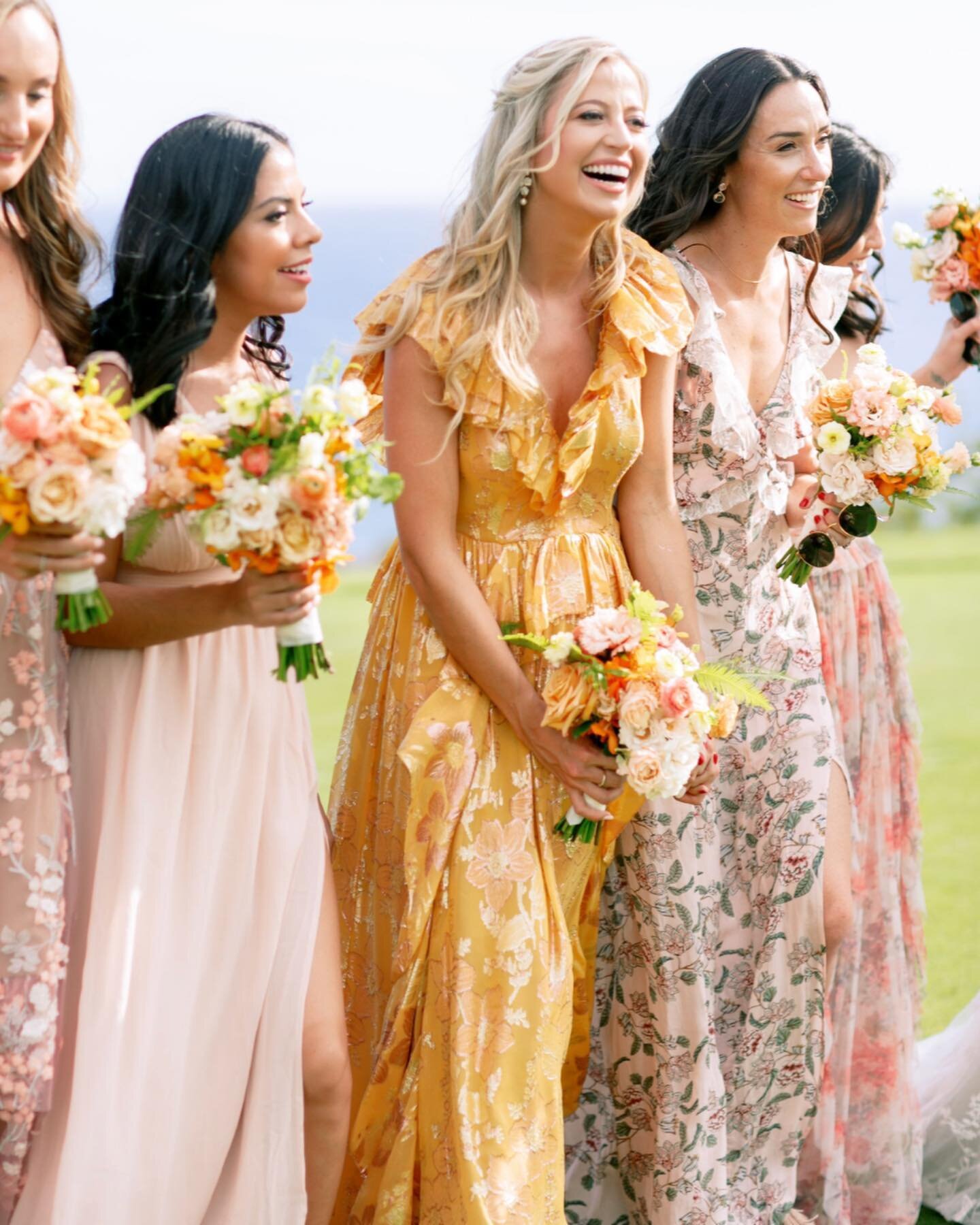 Mix and match bridesmaid looks call for bundles of blooming florals in feminine, spring hues. Photography by @ashleygoodwinphoto with @ked_and_co at @fslanai