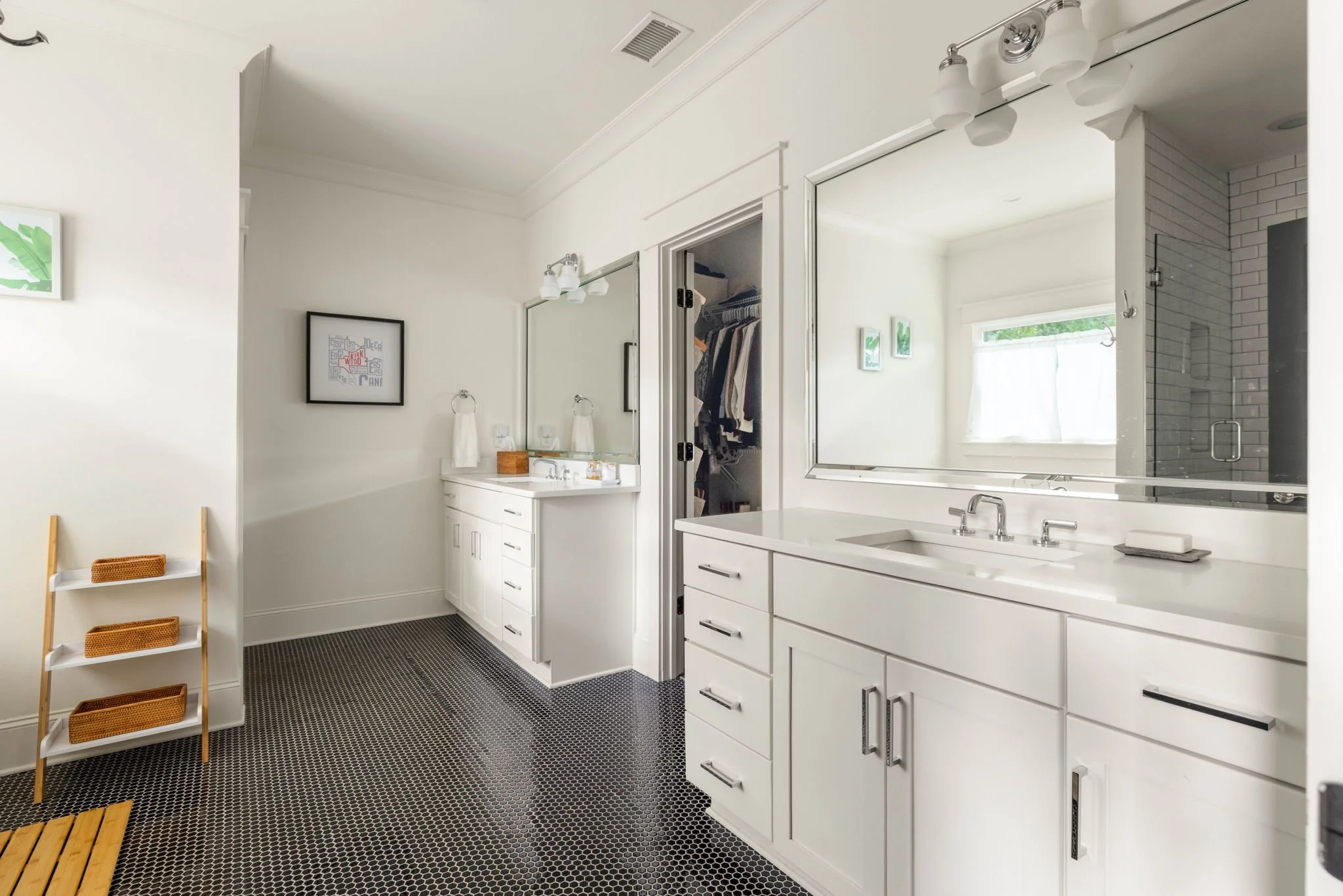  Primary en-suite bathroom with double vanities 