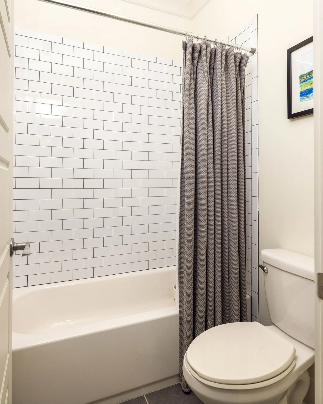  jack-and-jill bathroom tub with subway tile 