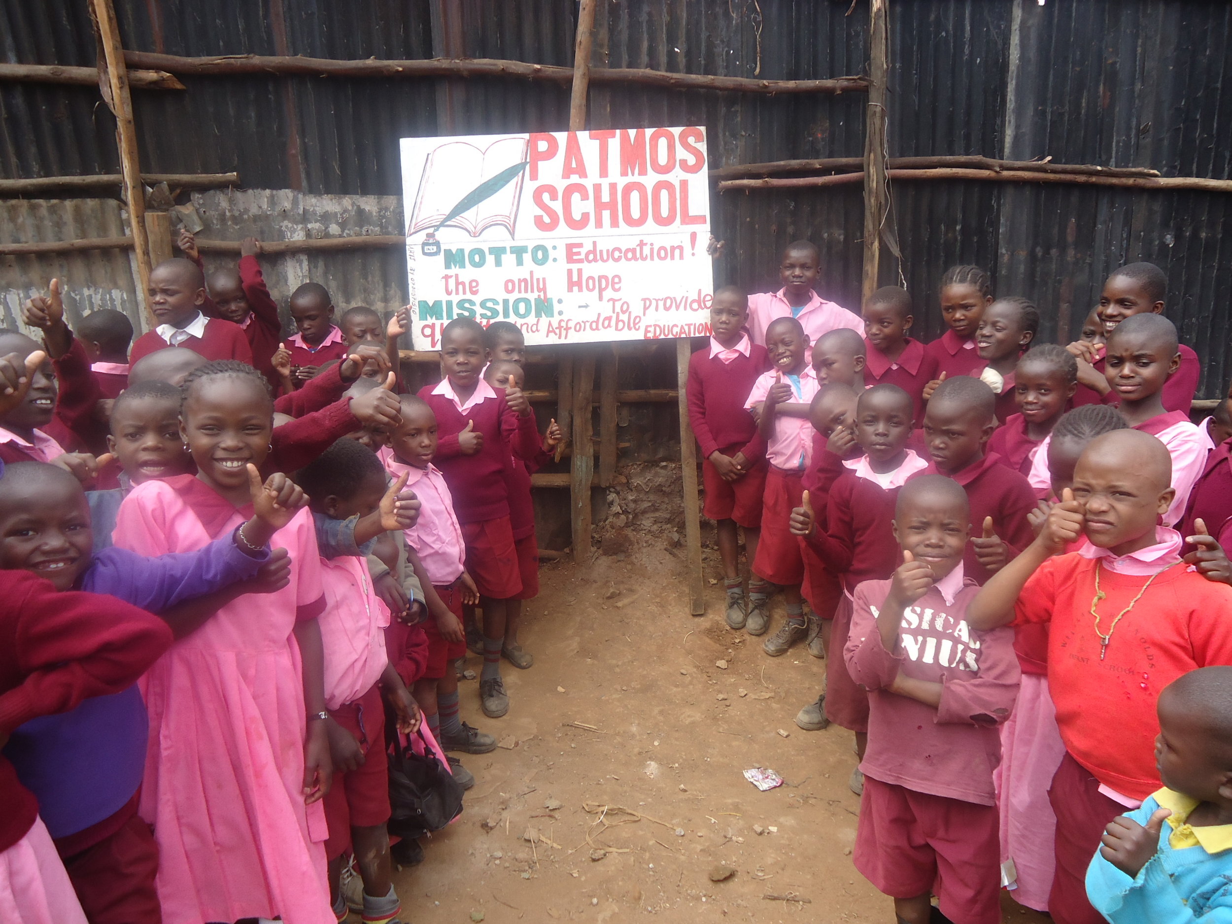 5. children with school sign Feb 2017.JPG