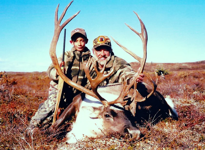 Grandson Jared and me with his beautiful caribou.