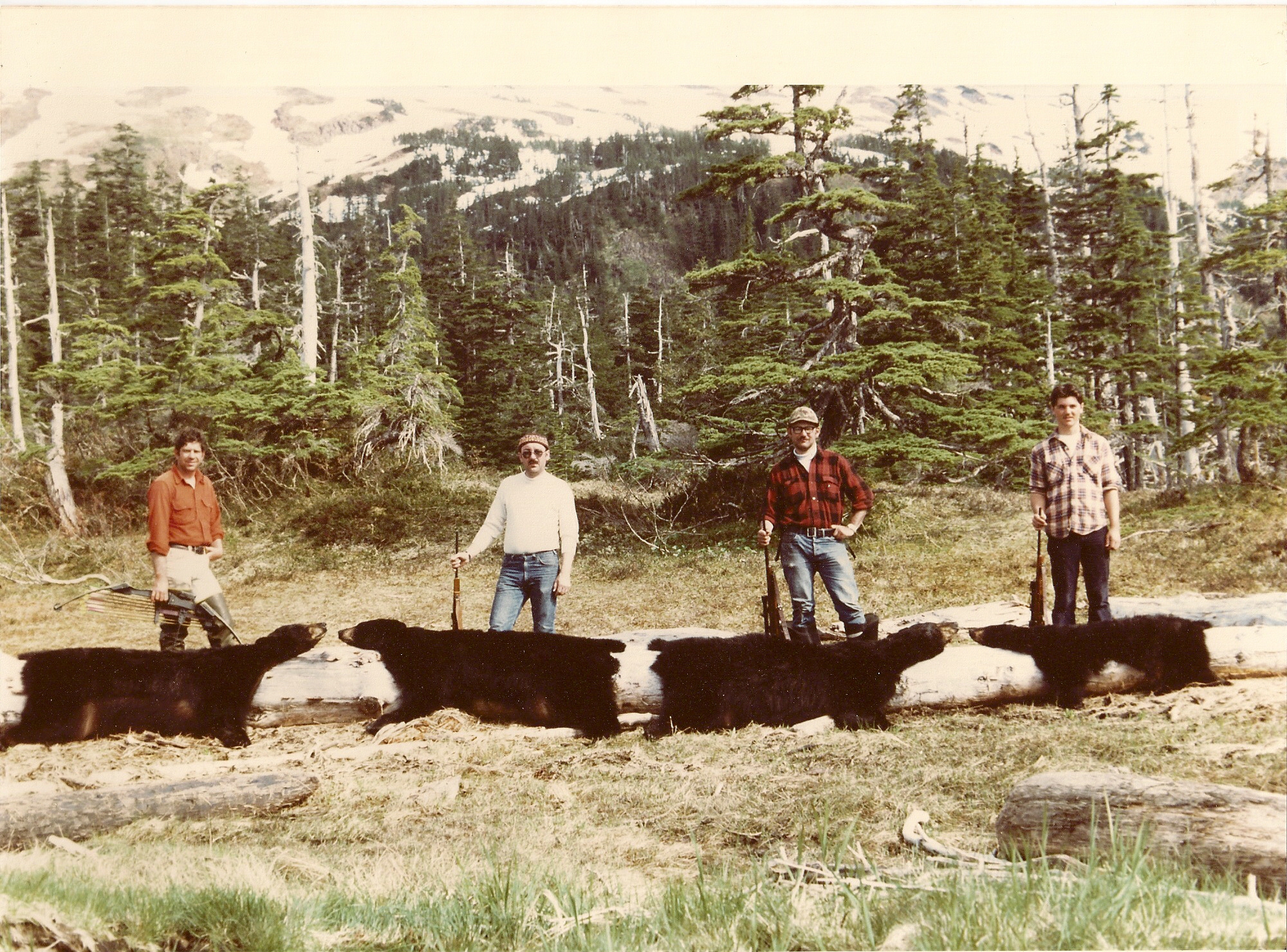 This was the second year that we harvested 4 bears in a weekend. Two of these bears were tagged with radio collars. From (L to R) myself, Earl Boucher, Dan Schwarzer (later became my partner in the guide business) and Scottie Bailey.